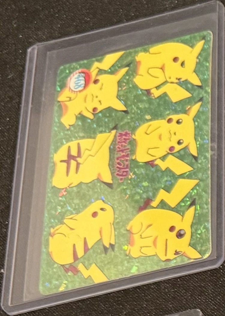 Pocket Monsters prism sticker — Pikachu chorus (kanji, green), graded RAW · UNGRADED — the exact slab for sale
