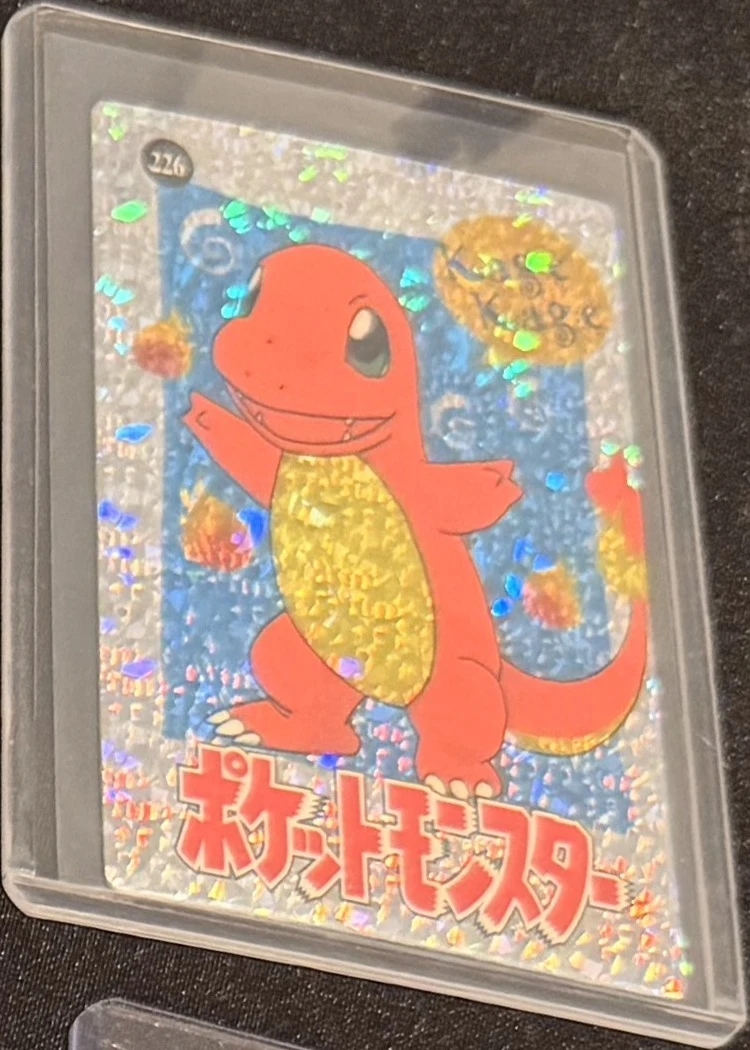 Pocket Monsters prism sticker — Charmander (silver), graded RAW · UNGRADED — the exact slab for sale
