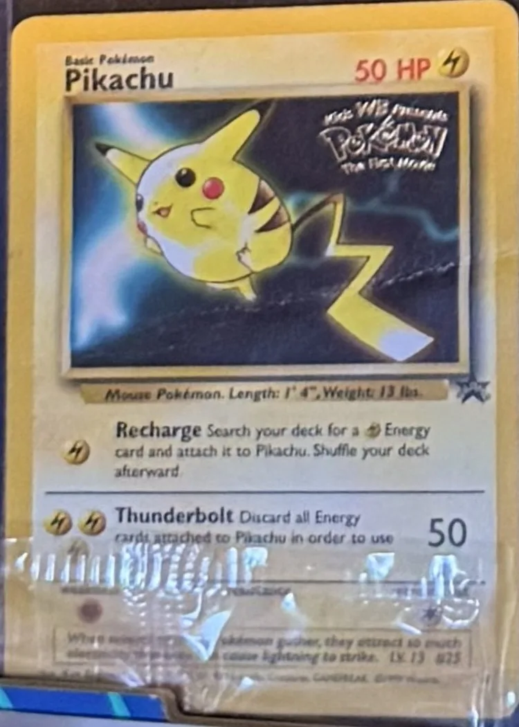 Pikachu (WB movie black star promo), graded RAW · UNGRADED — the exact slab for sale